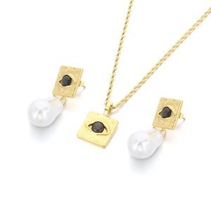 French vintage titanium steel jewelry set with pearl pendants and devil eye motifs