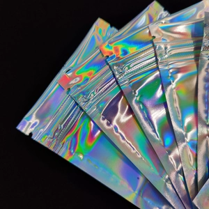 Holographic laser ziplock bags with rainbow metallic reflection on black background