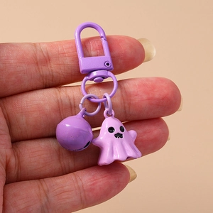 Cute purple 3D ghost keychain with matching bell and hook for creative backpack decor
