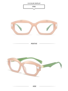 Detail view of pink modern retro sunglasses with green temples in front and side perspectives