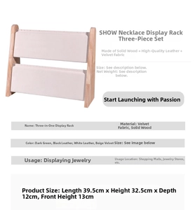 Detail view of double-row wooden jewelry stand with cream velvet display panels