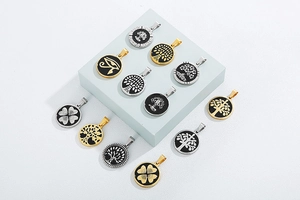 Macro shot of stainless steel Tree of Life and Eye of Horus pendants in gold and silver