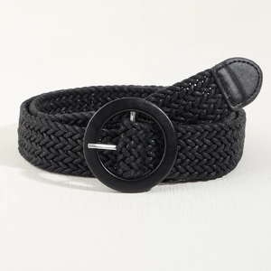 Close-up of black elastic woven belt with a round leather buckle for summer dresses