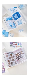 Close-up of frosted PP photo album pages displaying stickers and clear pocket sleeves