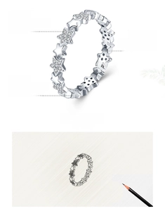Macro detail of S925 sterling silver star ring with hand-set 5A cubic zirconia stones