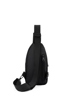 Minimalist black men's chest bag in matte tech fabric with adjustable wide shoulder strap