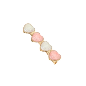 Cute pink and white heart-shaped floral hair clips with gold metal base for women