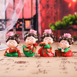 Set of four Tang Dynasty style lady figurines in red and green traditional Chinese outfits