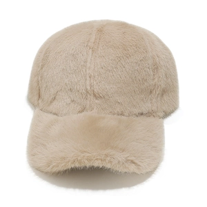 Close-up of soft beige faux fur texture on a thick winter baseball cap for women