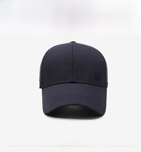 Detailed front view of navy baseball cap featuring silver metallic Style logo on front