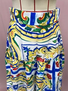 Detailed macro view of Majolica print pattern on high-waisted floral summer dress