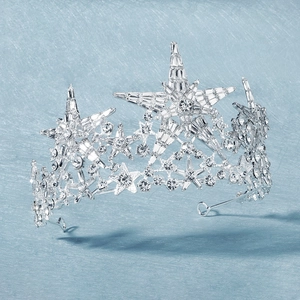 Luxurious silver bridal crown featuring shimmering crystal stars for weddings and parties