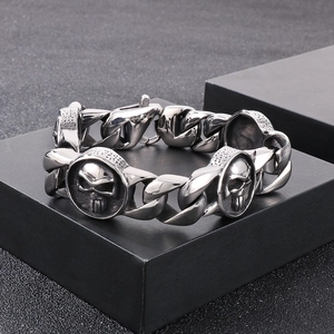 Punk style stainless steel Cuban chain bracelet with vintage skull charm for men