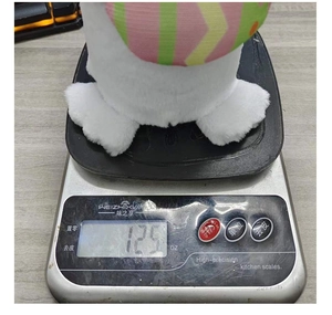 Detailed view of a white plush Easter bunny ornament weighing 125g with soft fuzzy texture