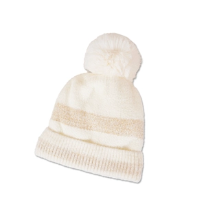 Detail shot of winter knit beanie showing fluffy pom pom and gold striped texture