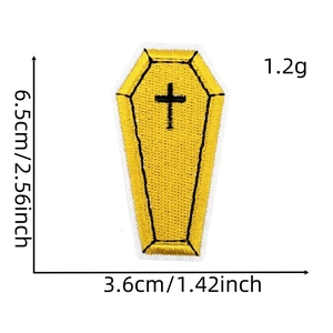 Detail of yellow coffin embroidery patch with cross and 6.5cm x 3.6cm size dimensions