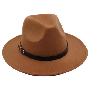 Close-up of a camel felt fedora hat featuring a black leather band and silver buckle