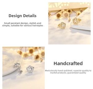 Detailed view of sterling silver plum blossom stud earrings with micro-set zircons
