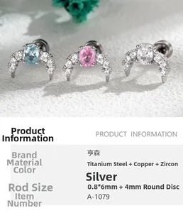 Macro detail of crescent zircon cartilage studs in silver with 0.8mm screw back size
