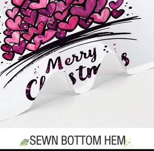 Detail of sewn bottom hem on waffle fabric Christmas shower curtain with heart tree print
