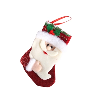 Christmas stocking with Santa Claus applique and sequins on a white background