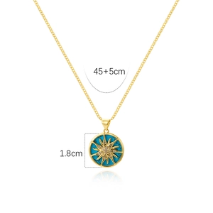 Gold sun pendant necklace detail with blue gemstone, 1.8cm diameter and 45+5cm chain length
