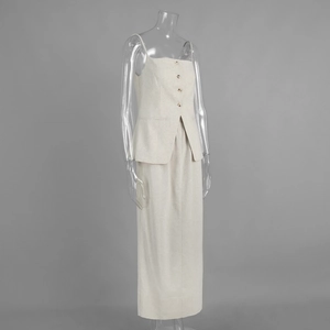 Detailed texture of beige button-down camisole top and matching high-waist midi skirt set