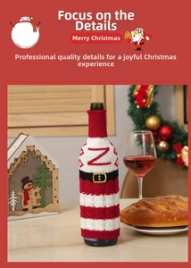 Detail of Christmas santa style knitted wine bottle cover with red stripes and belt