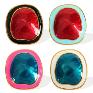 Irregular geometric earrings set with contrasting colorful enamel and gold metal finish