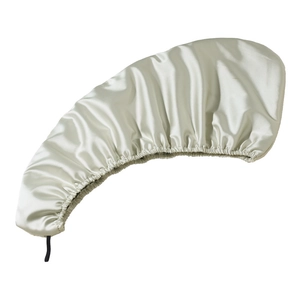 Detailed view of the champagne gold satin hair bonnet with smooth silk-like texture