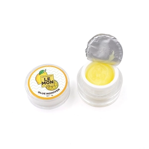 Macro shot of lemon eyelash extension glue remover in a 5g jar with yellow paste
