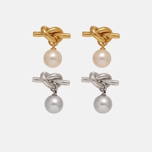 Minimalist metal knot earrings with white and grey pearls in gold and silver finish