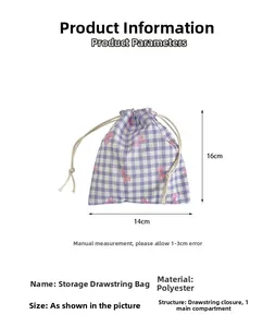 Blue and white plaid drawstring pouch with pink bow detailing and 16x14cm dimensions