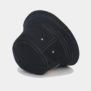 Retro denim fisherman hat in black with blue contrast stitching and breathable eyelets