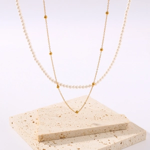 French style double-layer necklace with gold bead chain and white pearls on stone