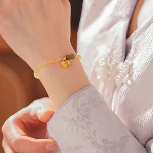 Perlenarmband im chinesischen Stil mit gelben Citrinperlen und goldenem Gourd-Anhänger
