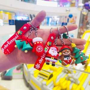Christmas silicone keychain set featuring Santa and Gingerbread man charms for gifts