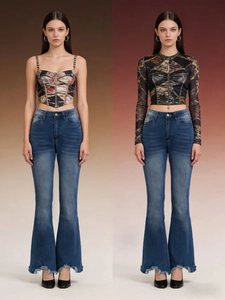 Detail of high-waisted flared jeans with distressed hems paired with mesh printed tops
