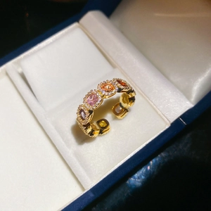 Detail view of 14k gold plated adjustable ring with colorful square cubic zirconia stones