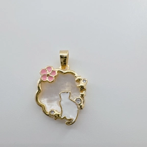 18K gold-plated cat pendant with white shell inlay, pink flower, and tiny diamonds