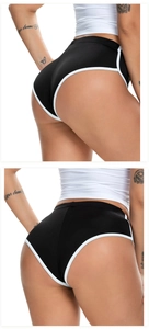 Detailansicht der schwarzen Sport-Shorts mit weißer Paspelierung für perfekte Passform