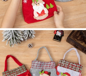 Detail of felt Christmas gift bags with 3D Santa and reindeer embroidery designs