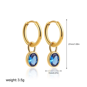 Detail view of 18K gold earrings with blue zircon pendant and exact size measurements