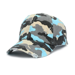 Detail of blue camo ponytail baseball cap with distressed torn fabric and side embroidery