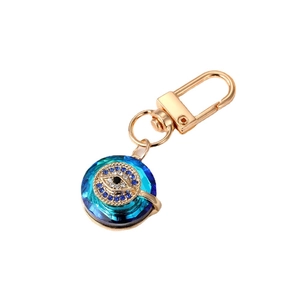 Exquisite crystal evil eye keychain with gold metal clasp and blue faceted pendant charm