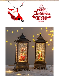 Close-up of vintage bronze Christmas lanterns with snow globe scenes and glitter effect