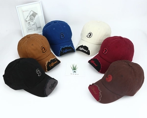 Top view of baseball caps with 3D letter D embroidery and frayed brim in multiple colors
