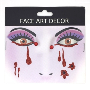 Detail of Halloween face stickers with red glitter blood drips and spider web patterns