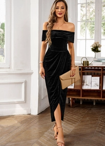 Elegant off-shoulder black velvet dress with ruched details and a front slit