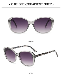 Front and 45-degree side view of cat-eye sunglasses in grey frames and gradient lenses